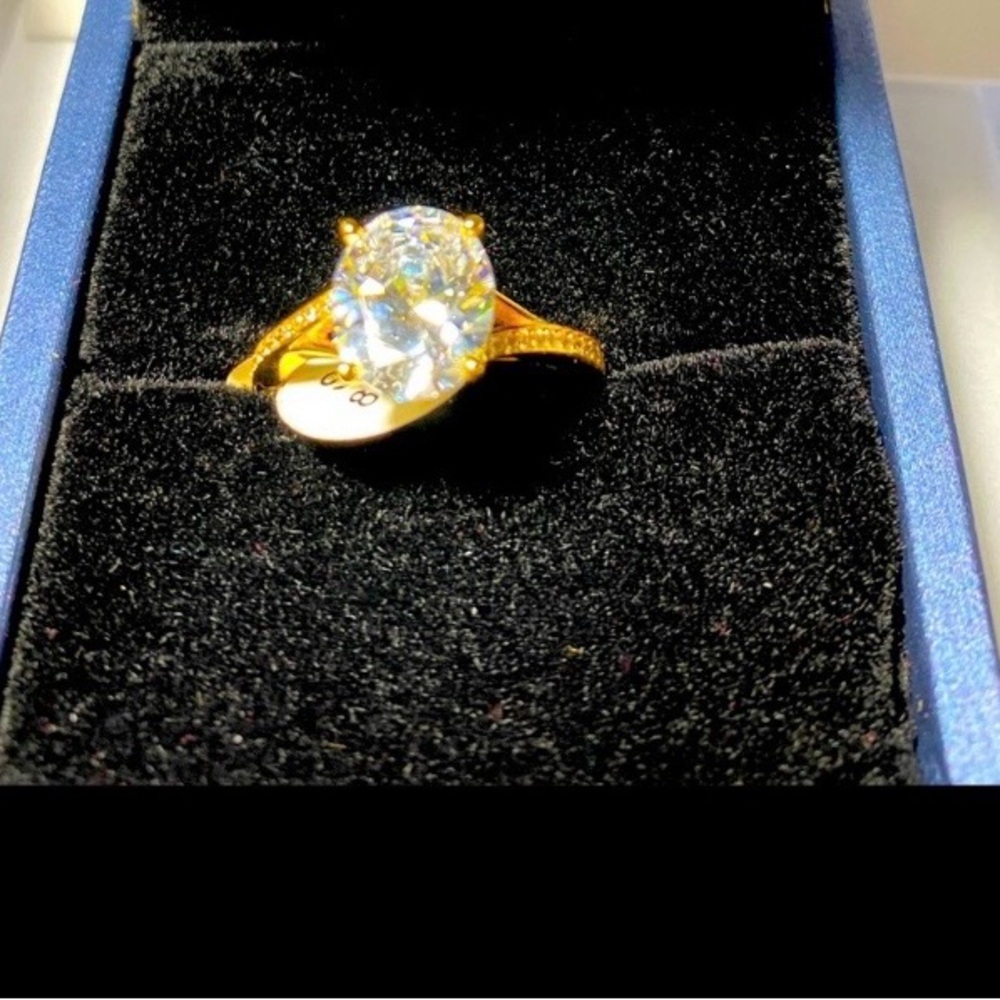 Radiant Gold Plated  Ring with Sparkling Gemstone